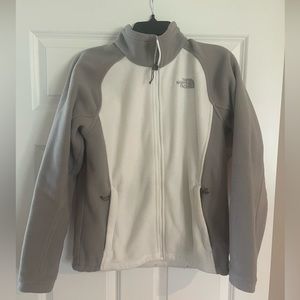 Gray and white north face fleece jacket